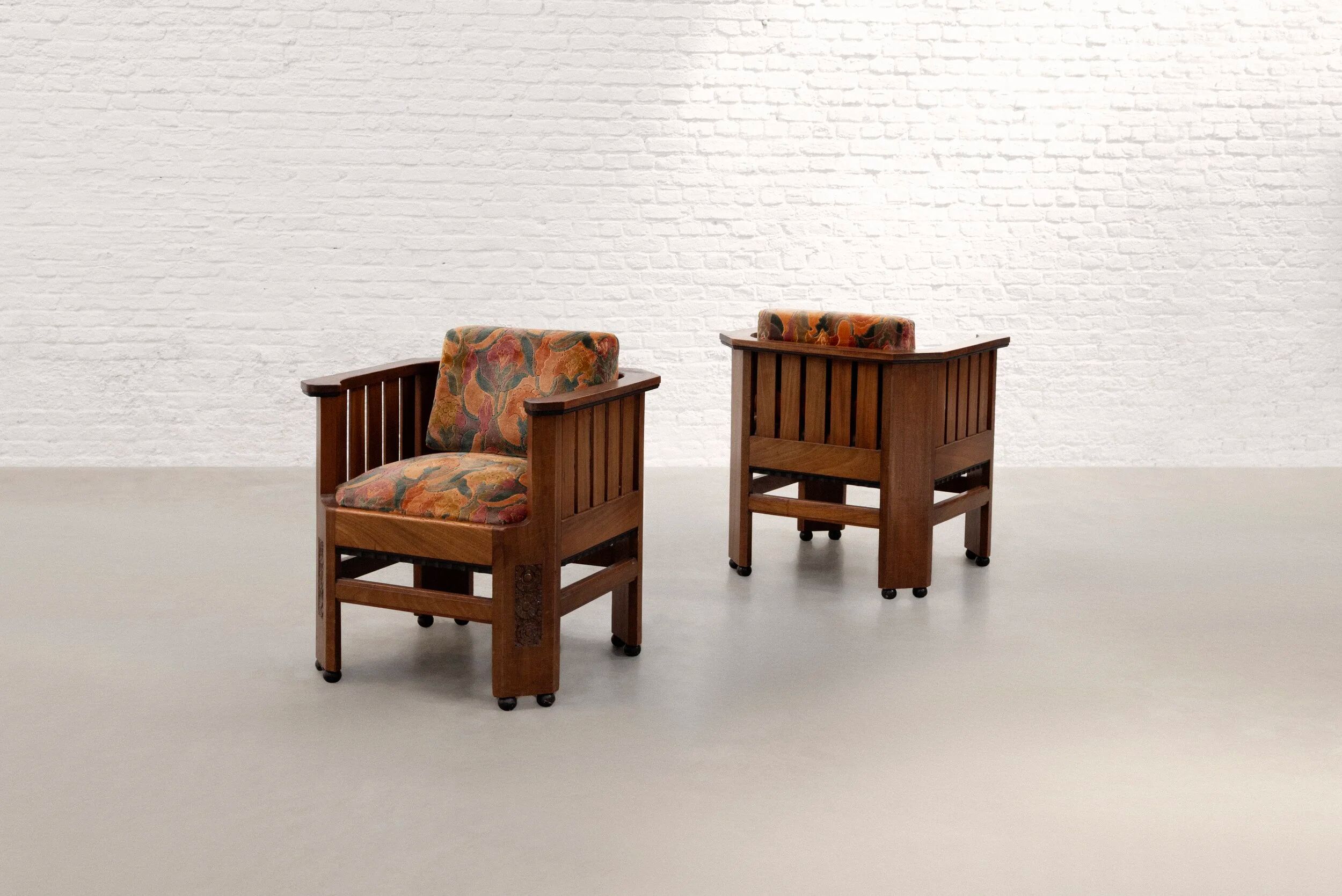 Pair of Amsterdam School walnut armchairs, Netherlands, c. 1930