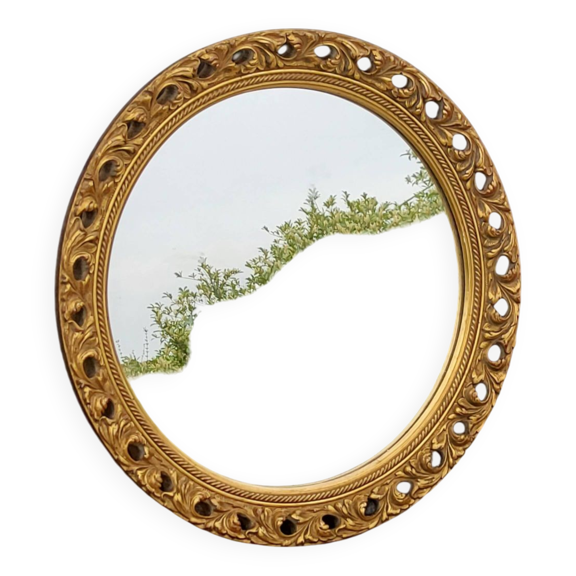 Round neoclassical style mirror in wood and gilded stucco from the 1950s