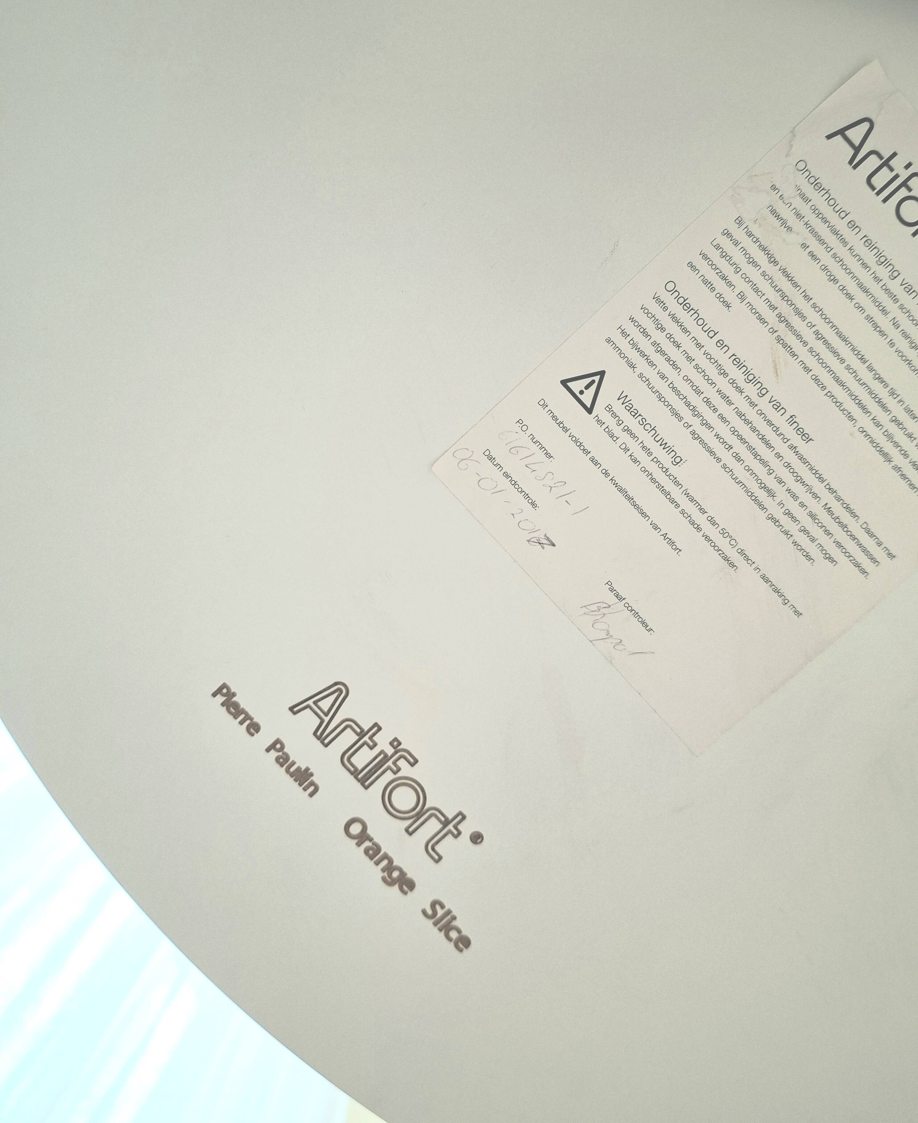 Table with orange slice by Paulin Artifort.