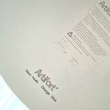 Table with orange slice by Paulin Artifort.