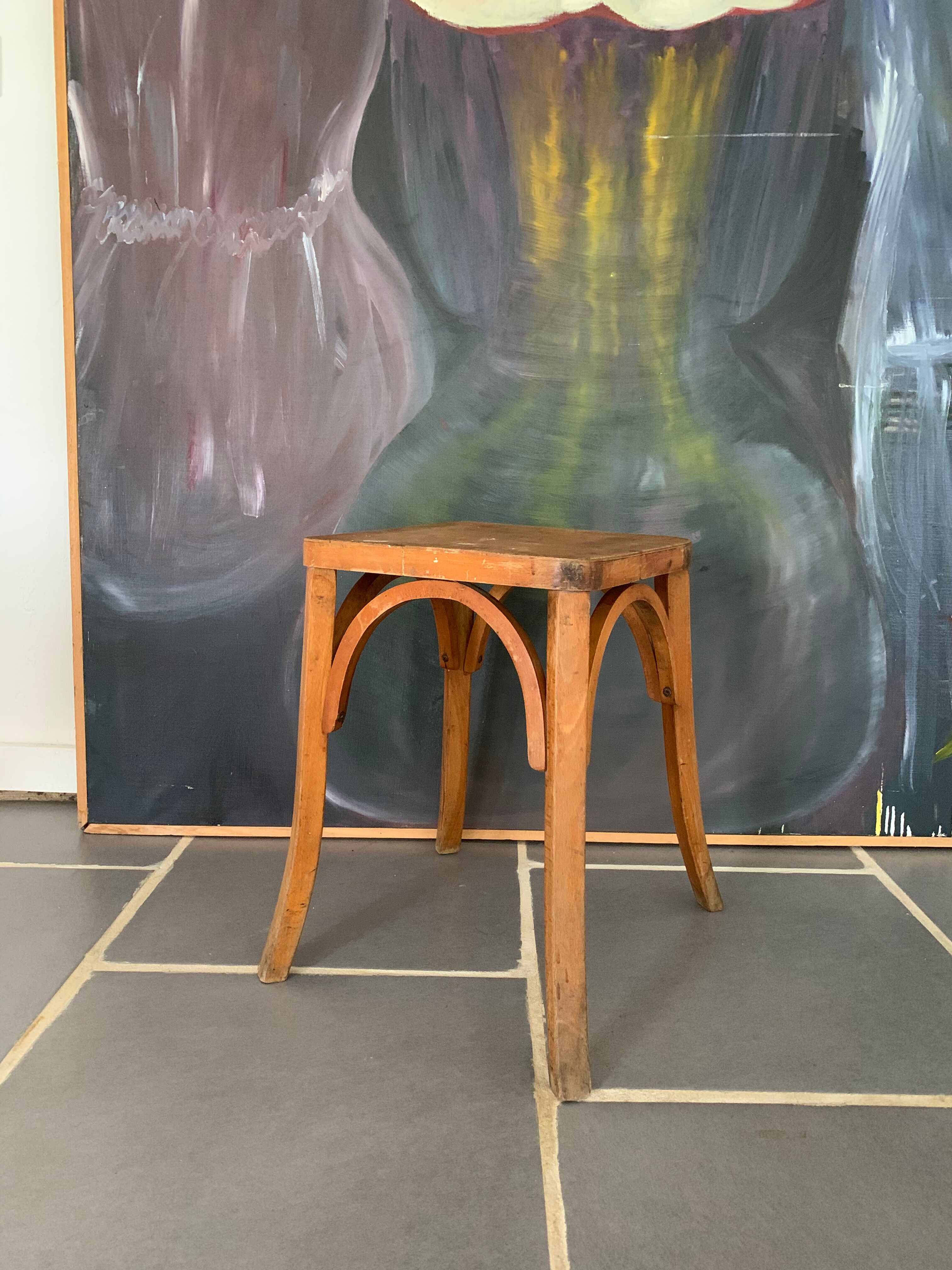 Vintage curved wooden stool