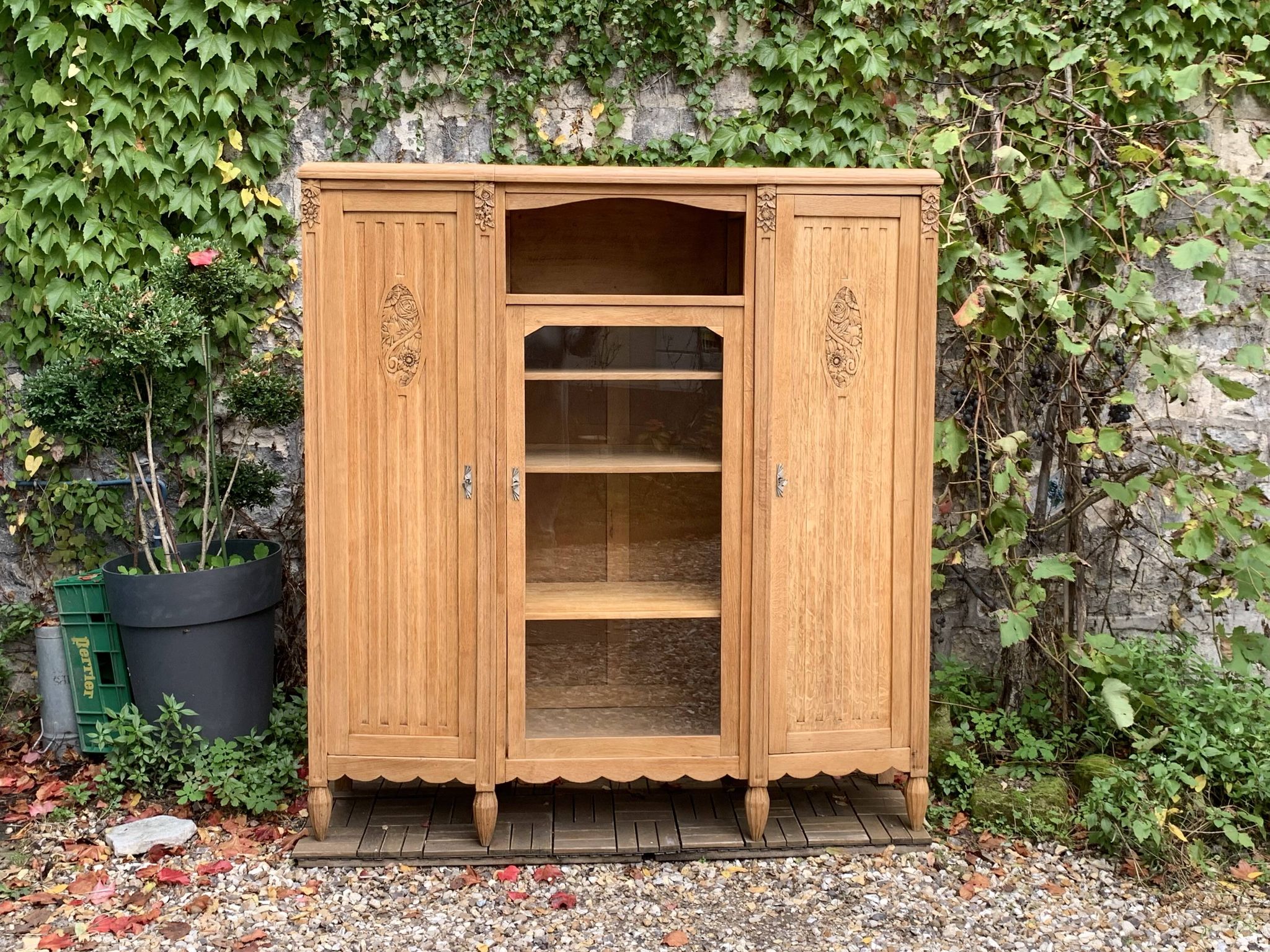 Asymmetrical Art Deco glass-fronted Parisian wardrobe in raw oak, 1930.
