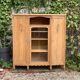 Asymmetrical Art Deco glass-fronted Parisian wardrobe in raw oak, 1930.
