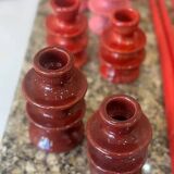 Red candlestick holder