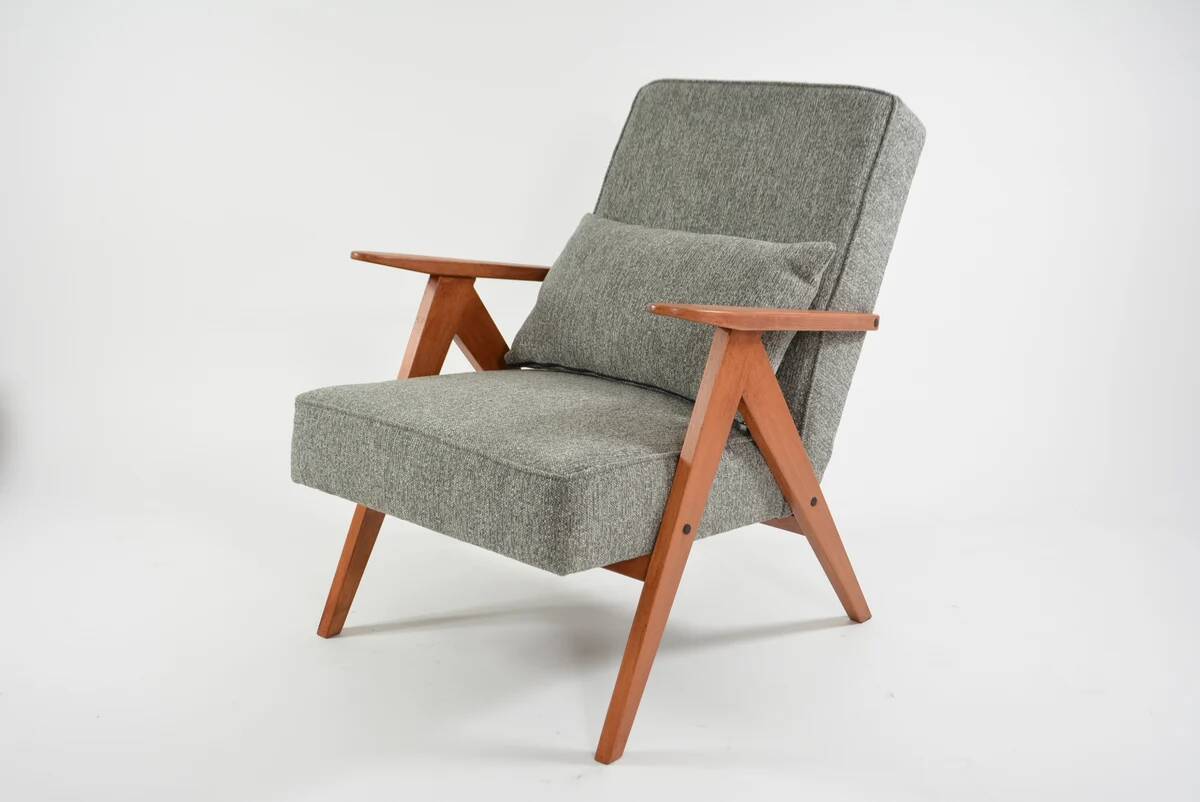 KOMPAS armchairs in grey and white.