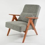 KOMPAS armchairs in grey and white.