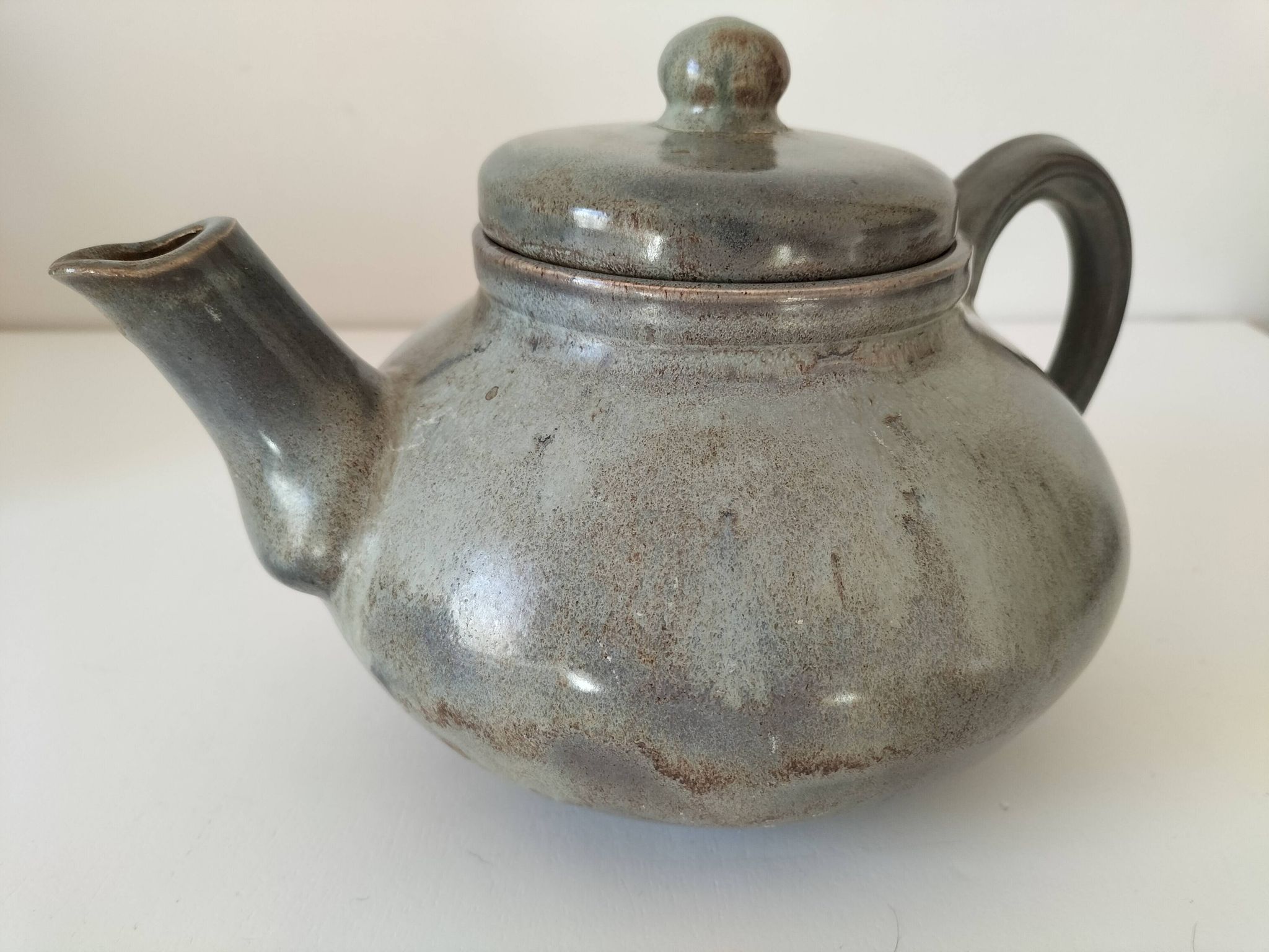 Large handcrafted celadon glazed ceramic teapot