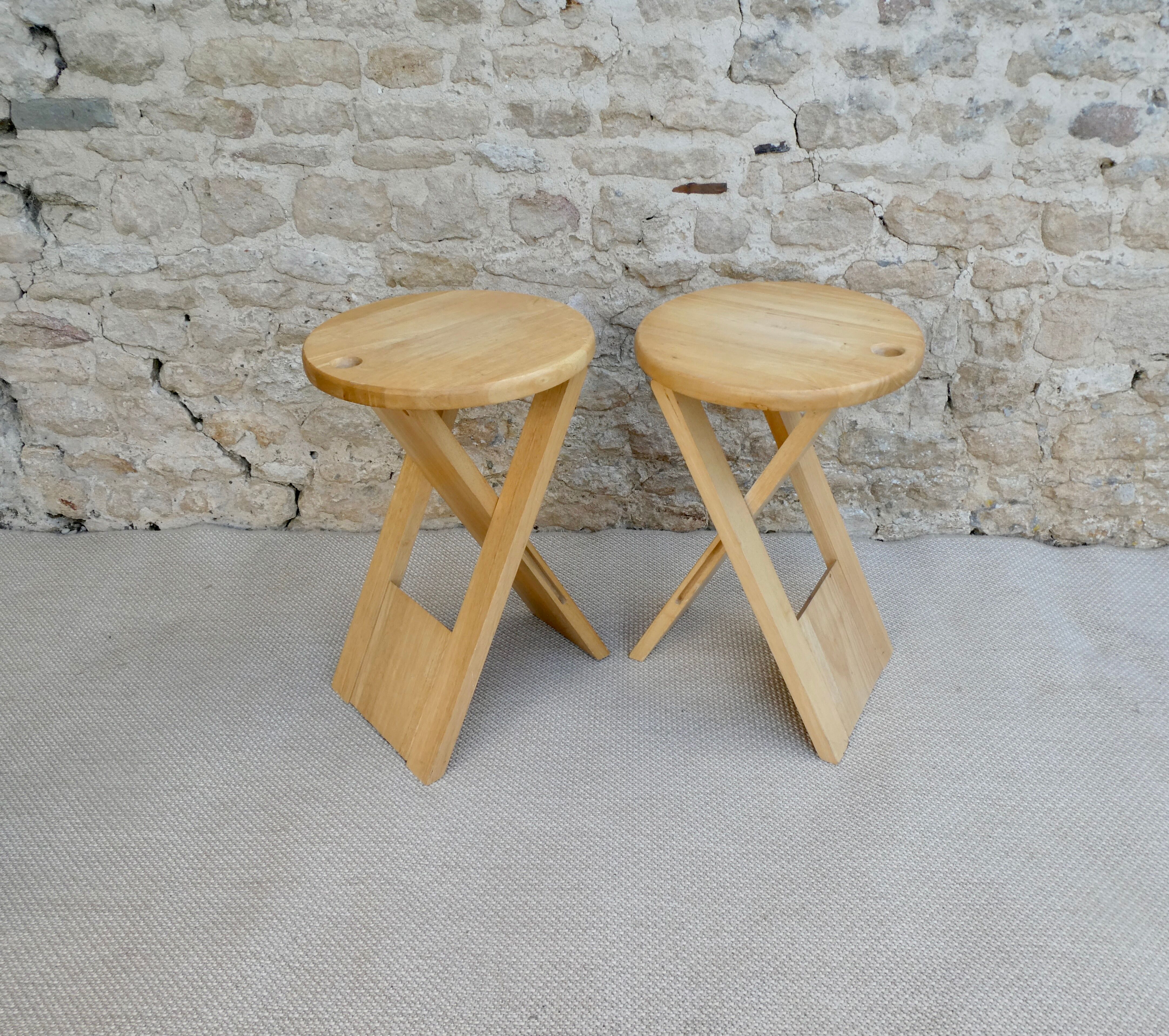 Pair of Adrian Reed wooden folding stools, 70s
