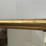 Louis Philippe mirror in wood and gilded stucco, 19th century