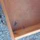 Commode vintage en chêne blond pieds compas 4 tiroirs 1950