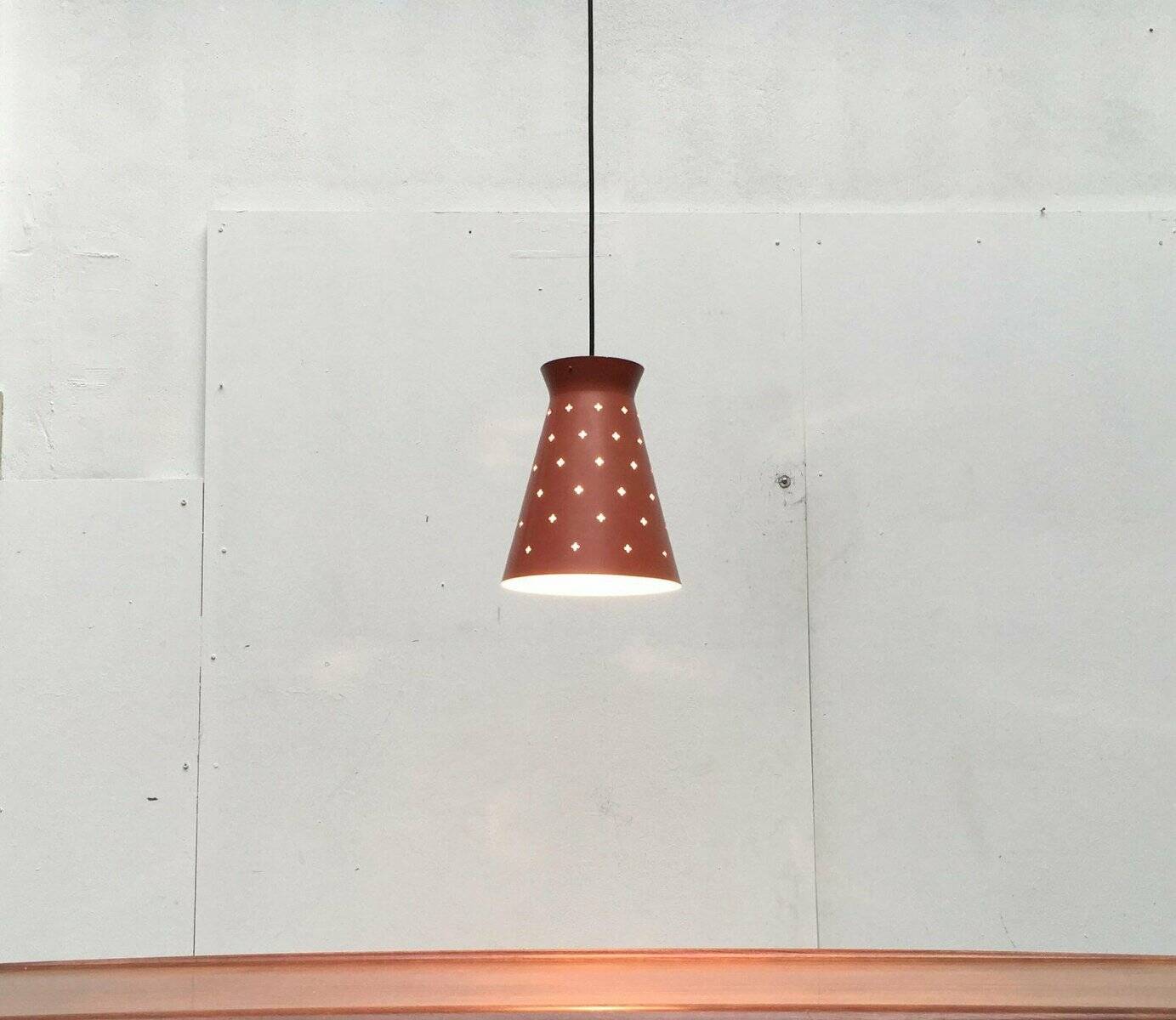 Perforated metal pendant light, mid-century design, 1960s.
