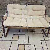 Tubular two-seater bench from the 1970s.
