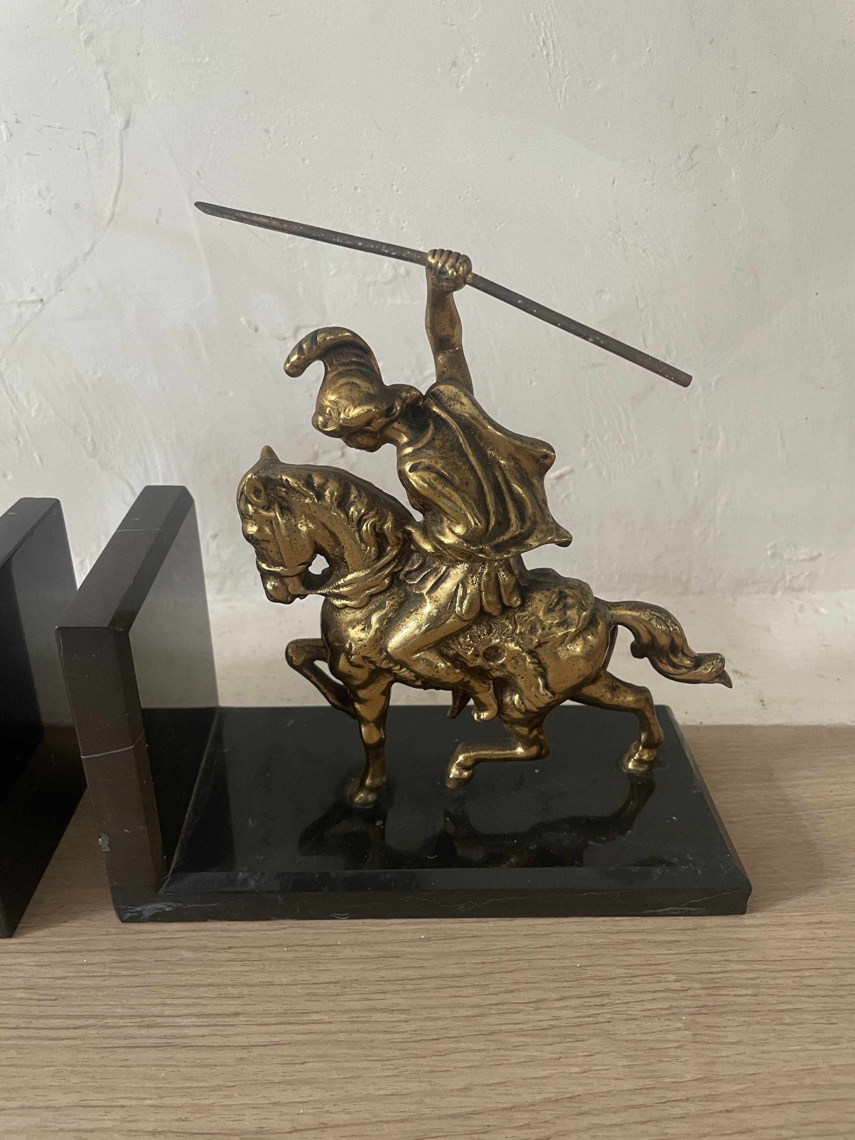 Pair of neo-classical Roman soldier bookends in marble and brass.