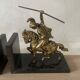 Pair of neo-classical Roman soldier bookends in marble and brass.