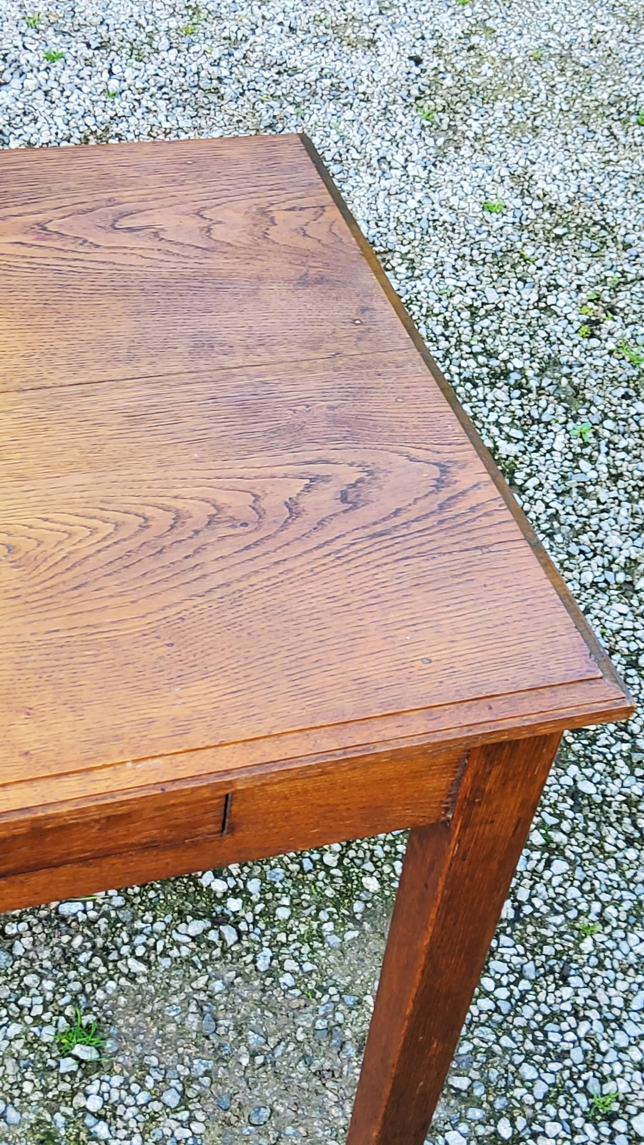 Oak writing table with spindle legs, early 20th century