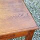 Oak writing table with spindle legs, early 20th century