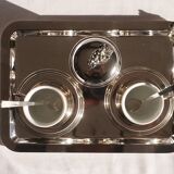 Silver-plated metal coffee service with a grape design.