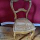 Light medallion chairs and carved fruit chairs.