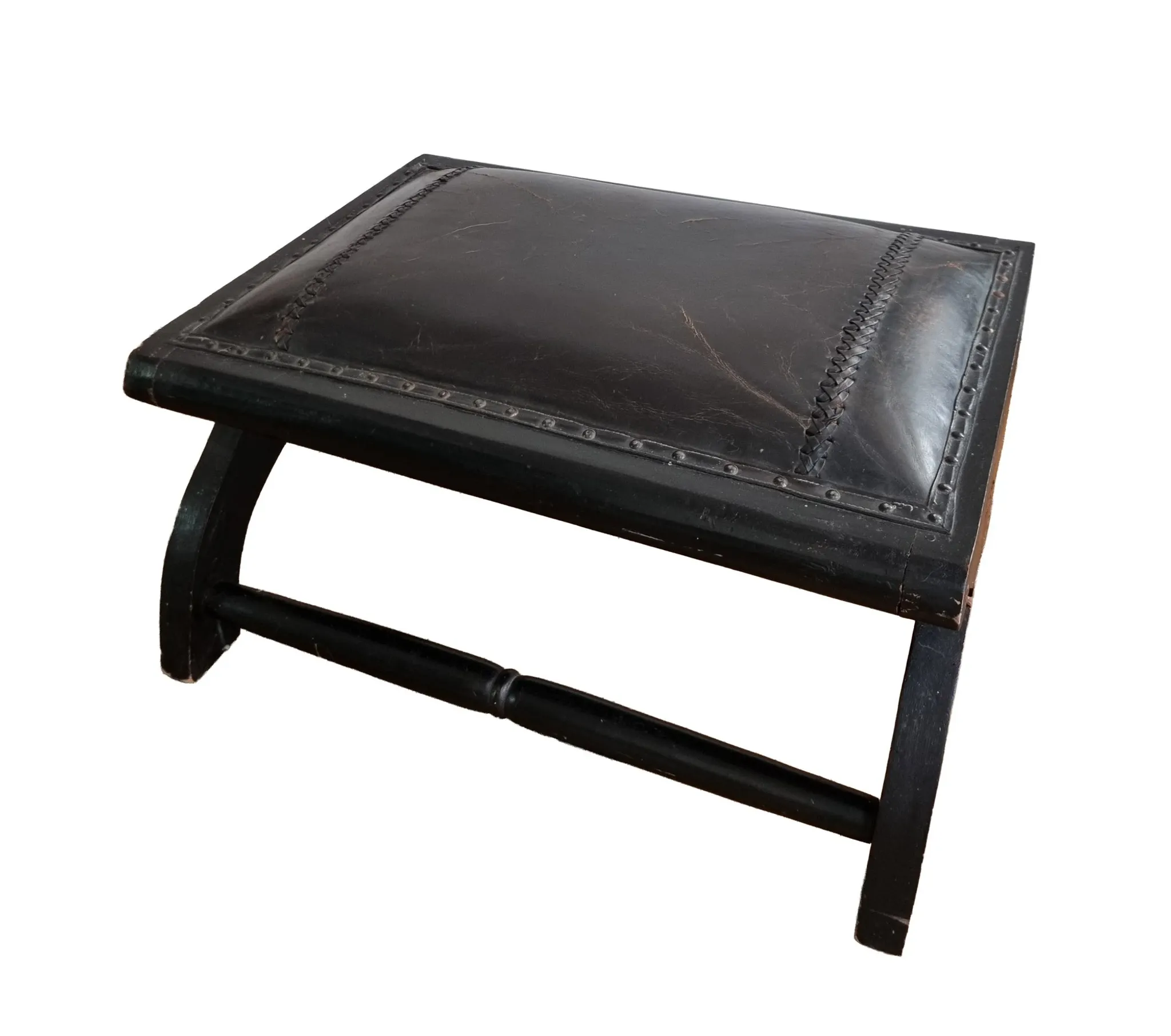Black leather footstool with curved legs – vintage
