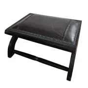 Black leather footstool with curved legs – vintage