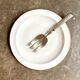 Round dish A. Vignaud in white and gold Limoges porcelain
