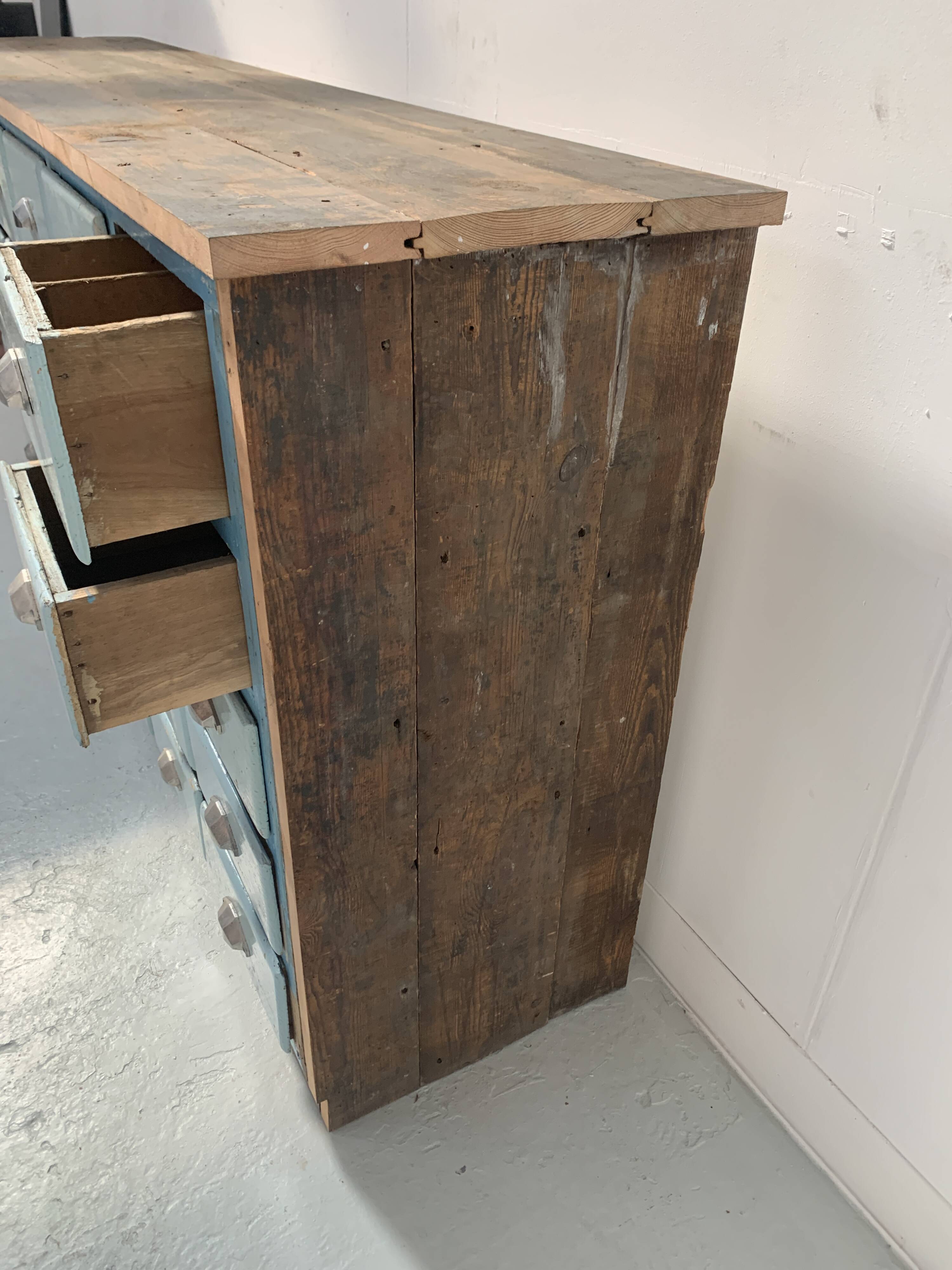 30-drawer storage unit in patinated fir, 20th century