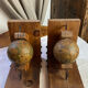 Pair of wooden bookends, rotating globes
