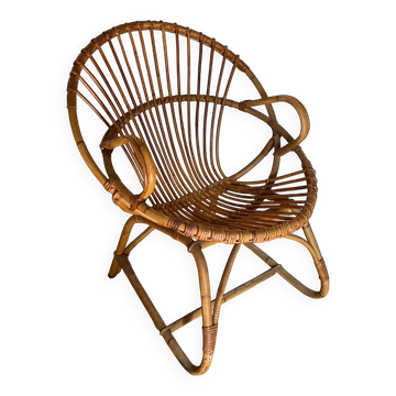 Rattan armchair with vintage design armrests