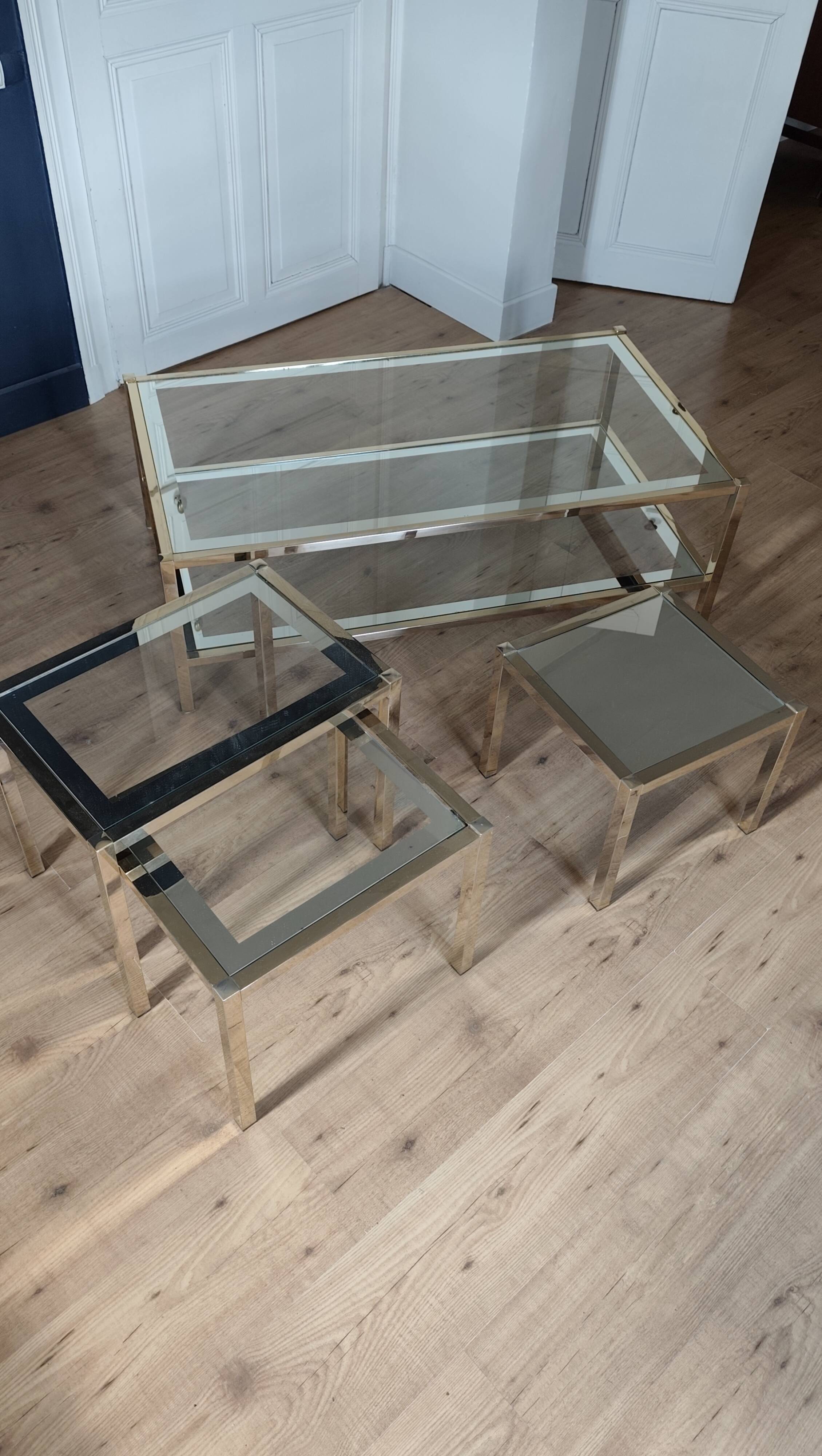 Vintage coffee table with glass, mirror, and brass.