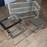 Vintage coffee table with glass, mirror, and brass.