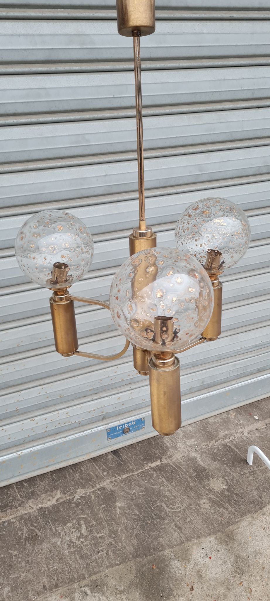 Brass and blown glass chandelier inlaid with gold