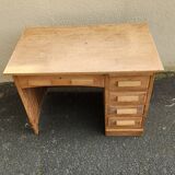 Vintage wooden desk with five drawers from the 1950s-1970s.