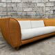 Canapé vintage en rotin design 1970 tissu bouclette écru