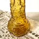 Bouteille, vase en verre ambré anges