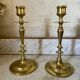 Old pair of turned brass candlesticks