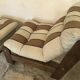 Vintage fireside chair and pouf circa 1980