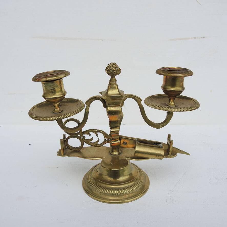 Antique 2-light candelabrum with scissors in bronze or brass.