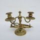 Antique 2-light candelabrum with scissors in bronze or brass.