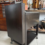 Old vintage industrial filing cabinet on wheels