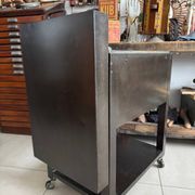 Vintage industrial filing cabinet on wheels