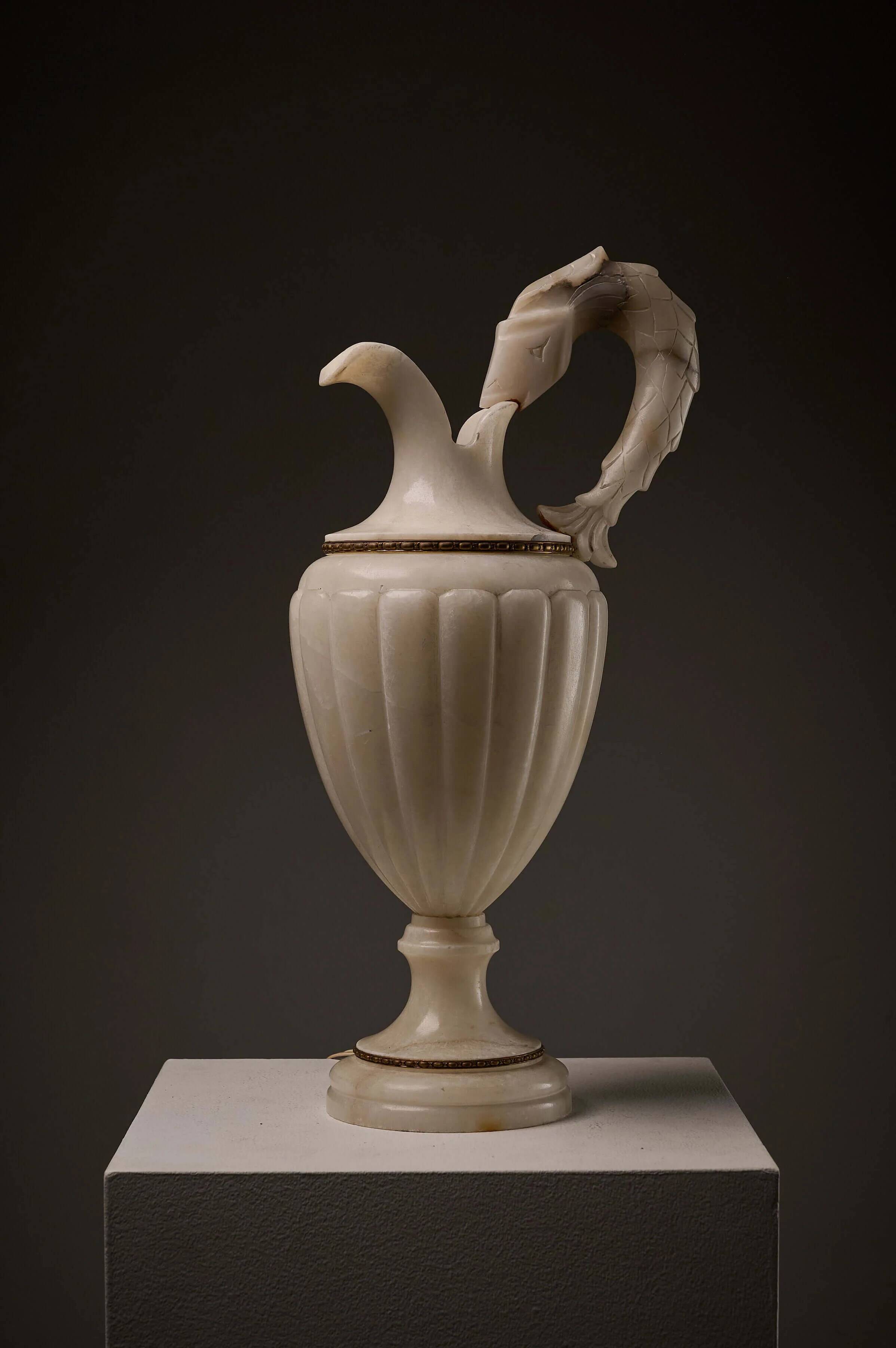 Carved alabaster urn lamp with stylized fish handle