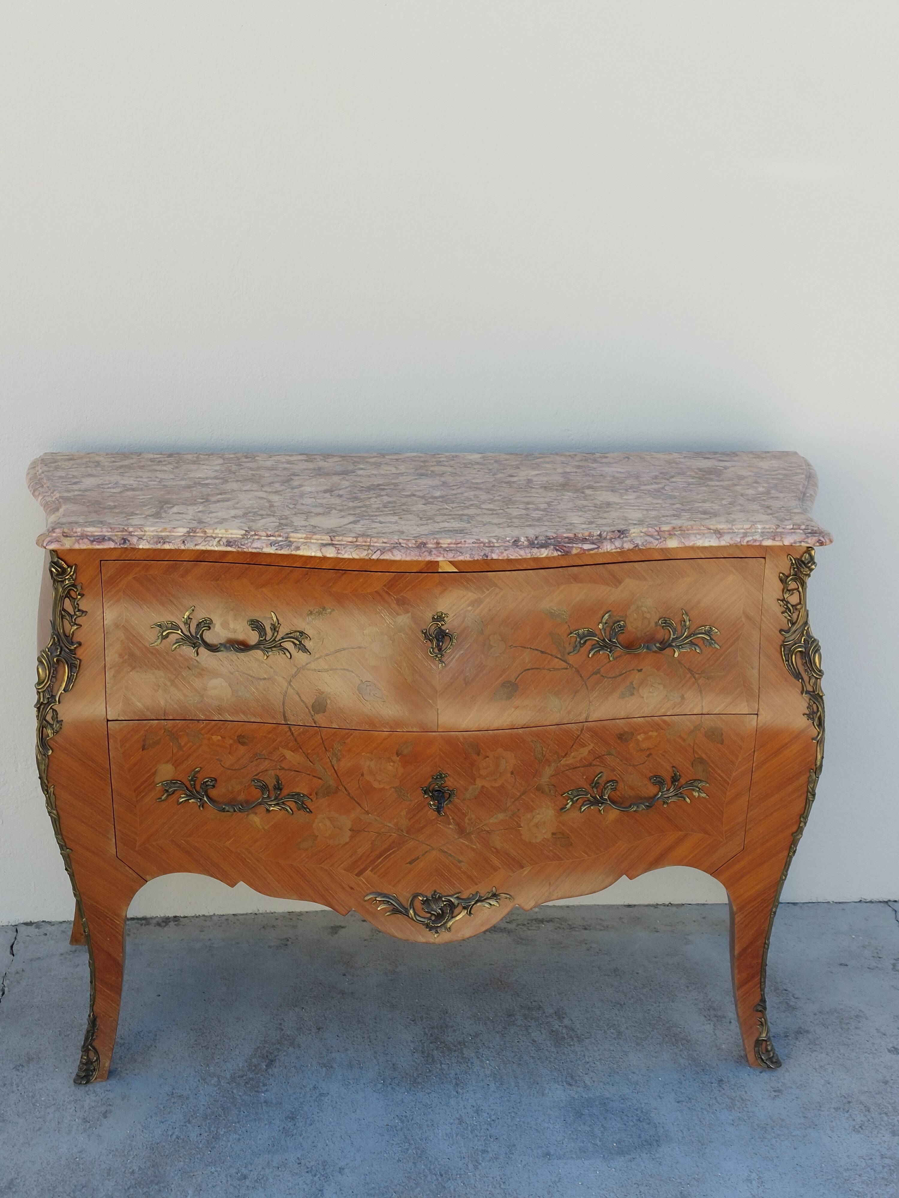 Louis XV chest of drawers in rosewood marquetry