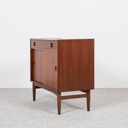 Midcentury Danish cabinet in teak with 1 drawer and 2 sliding doors 1960s