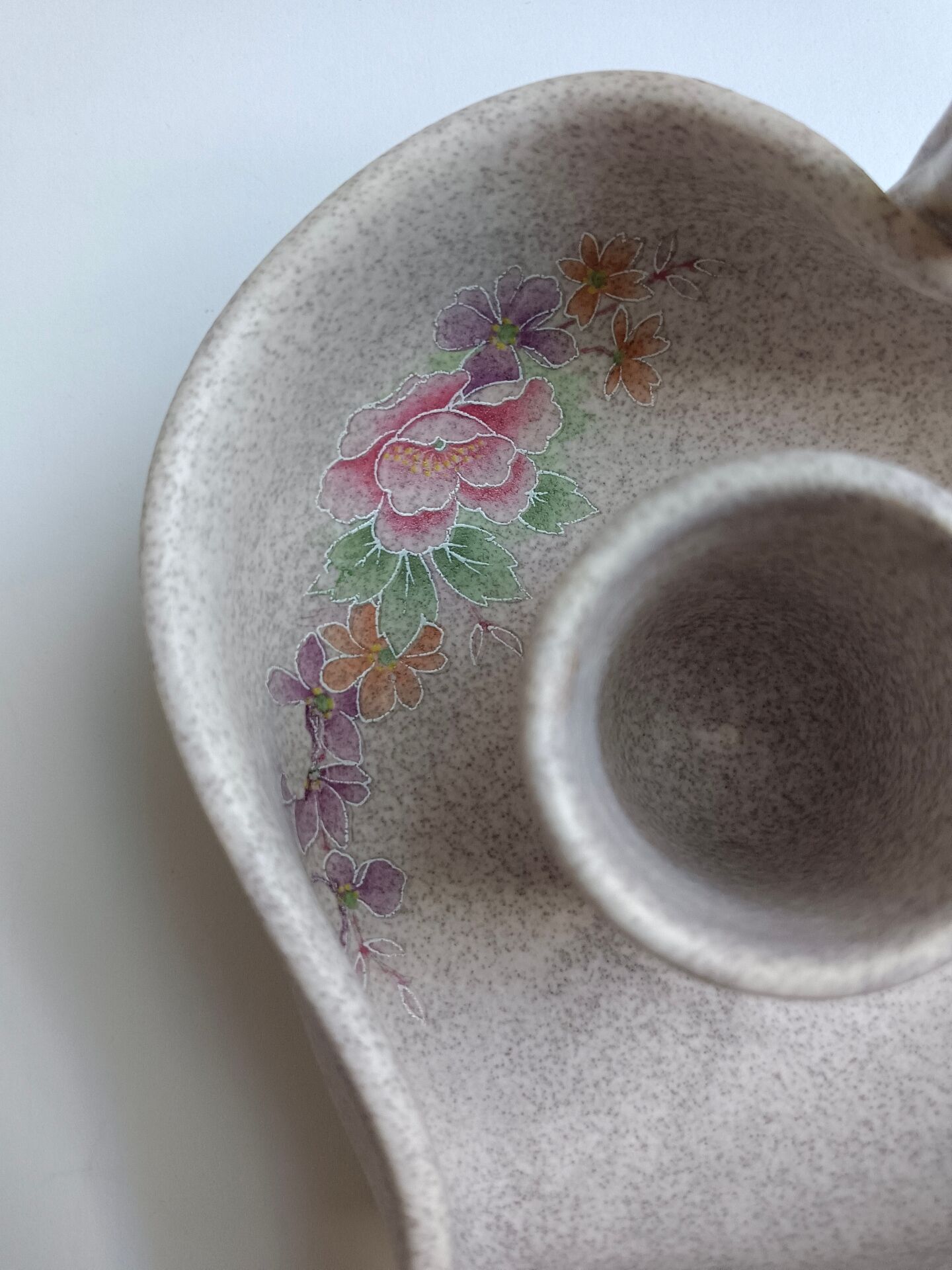 Vallauris grey candle holder with pink flowers, signed.
