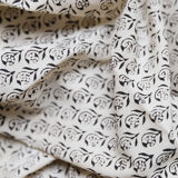 Set of 4 black and beige block-print towels