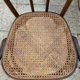 Baumann curved caned wood armchair, 1900
