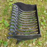 Old vintage black cast iron fireplace