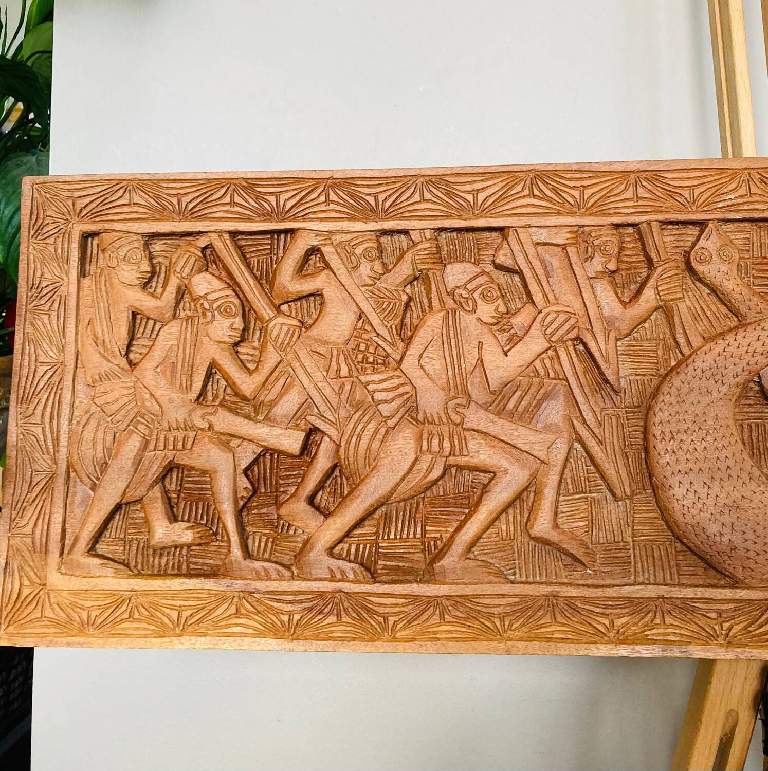 Bas relief African Art 20th century solid wood panel carved with Warriors