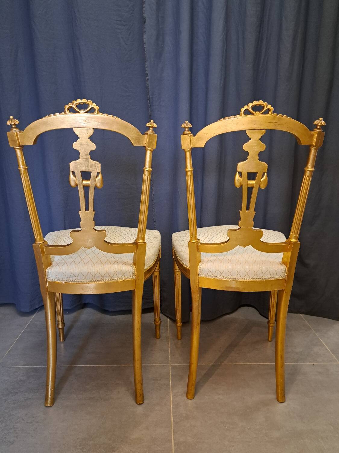 Pair of Napoleon III chairs in gilded wood