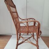 High-backed wicker armchair